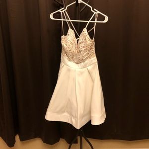 Beautiful laced v neck top connected with skirt